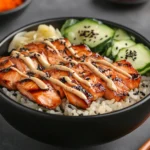 Modern salmon rice bowl with seared salmon and vegetables.